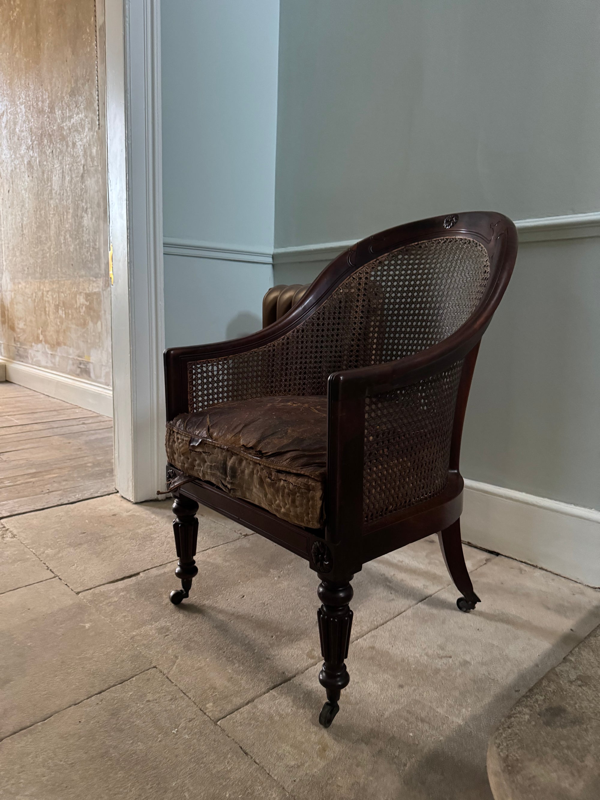 A Regency Mahogany Bergere Armchair Attributed to George Bullock