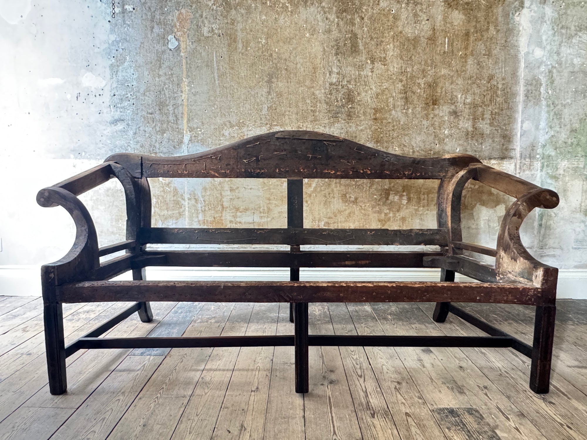 A 19th Century Camel Back Sofa