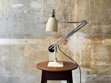 A Cream & Black H & H Desk Light