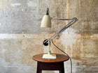 A Cream & Black H & H Desk Light