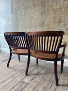 A 1920s Oak Two Seater Bench