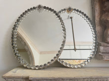 A Pair of Oval Glass Sphere Mirrors