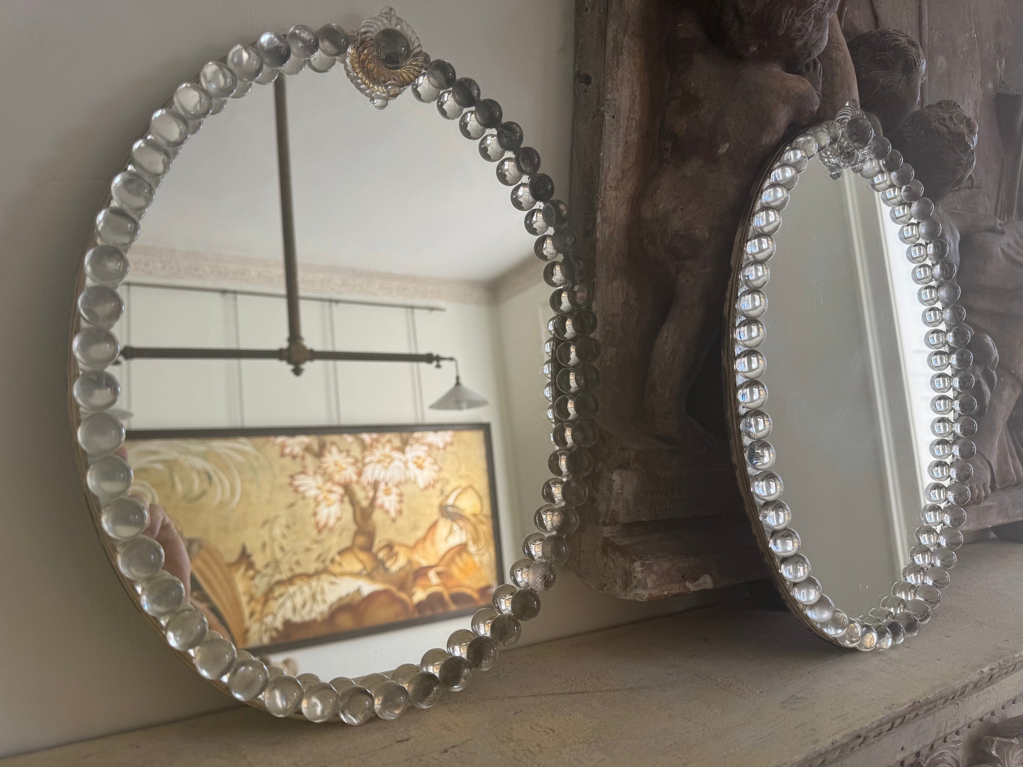 A Pair of Oval Glass Sphere Mirrors