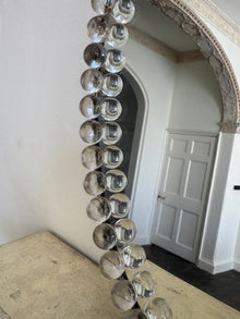 A Pair of Oval Glass Sphere Mirrors