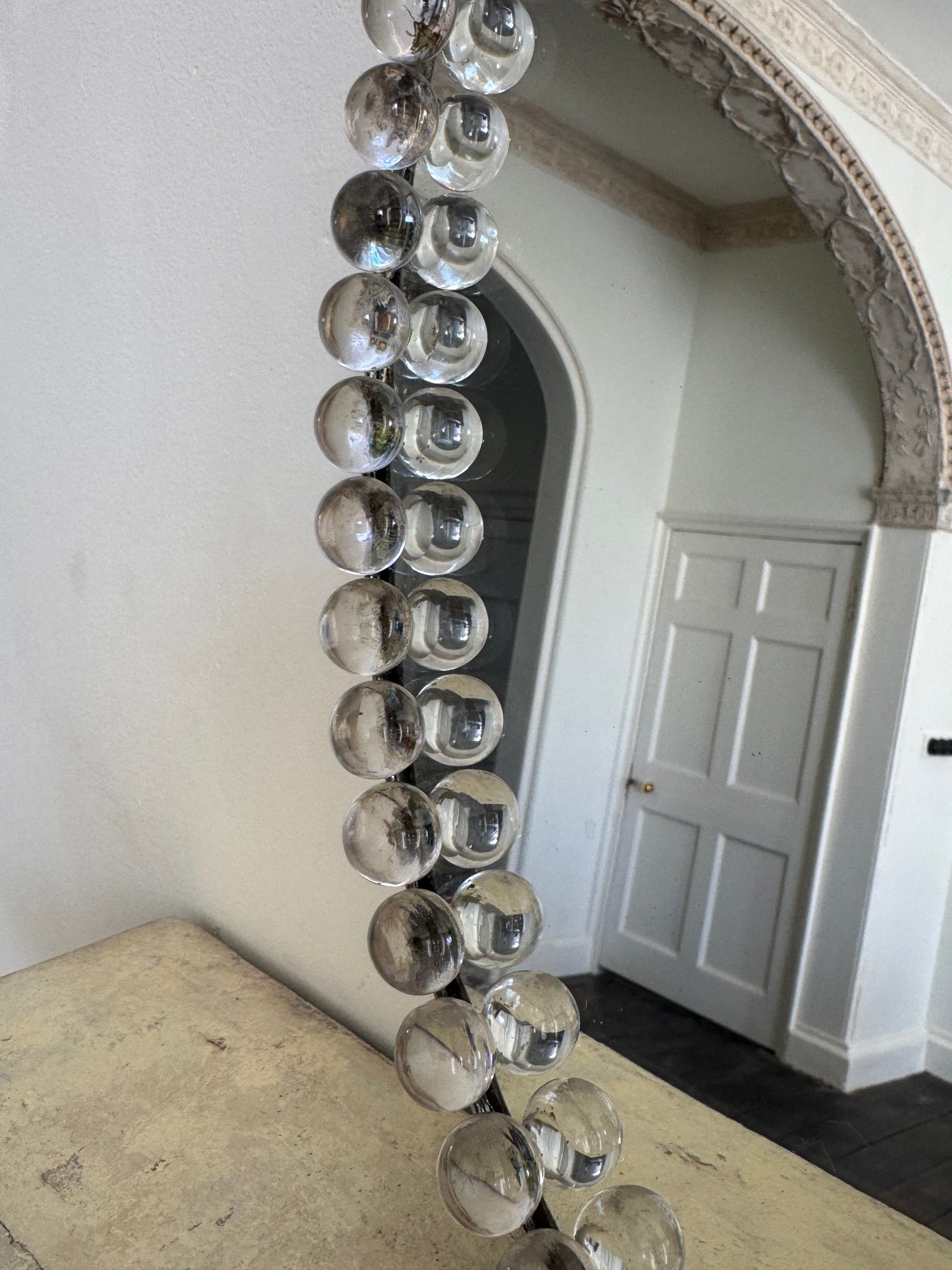 A Pair of Oval Glass Sphere Mirrors
