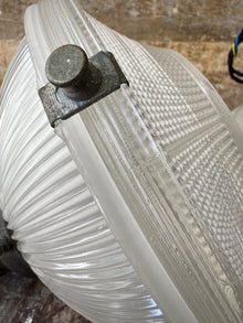 A Pair of Holophane Pendant lights