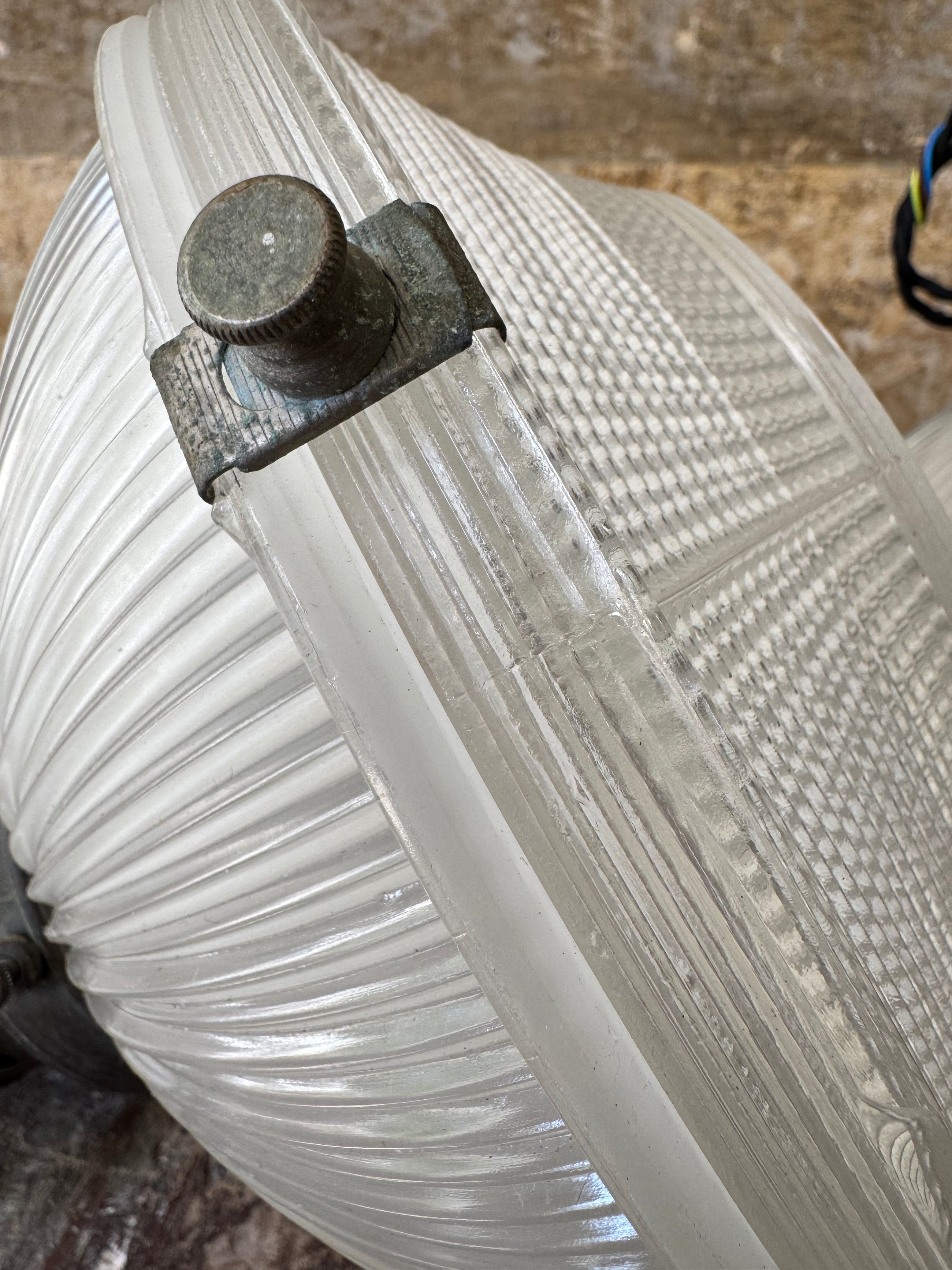 A Pair of Holophane Pendant lights