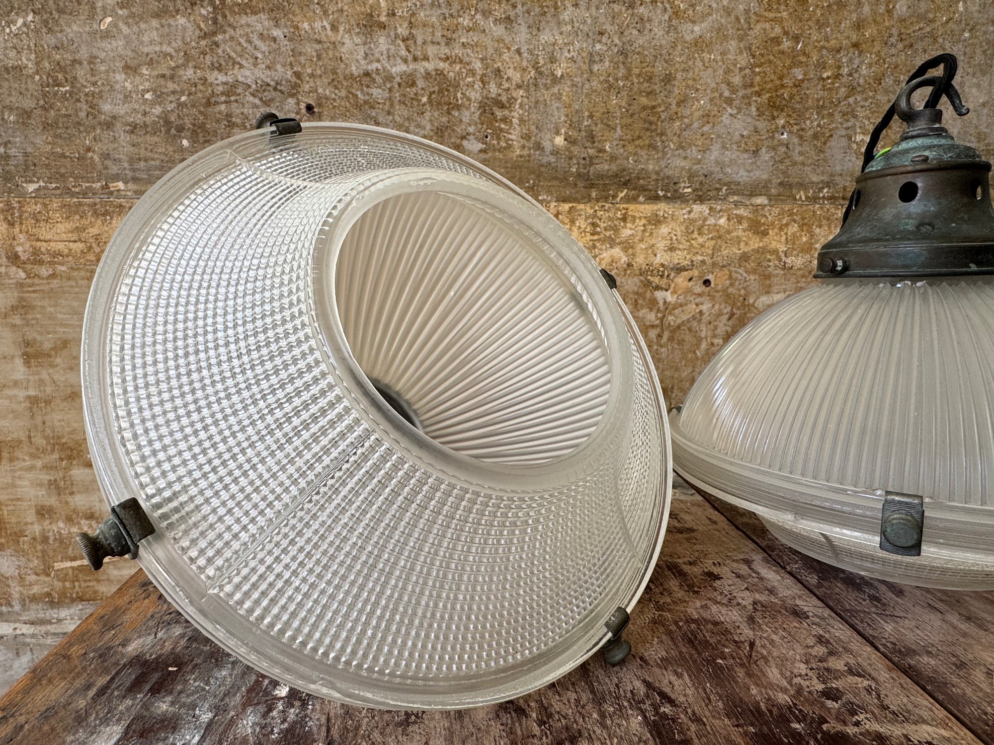 A Pair of Holophane Pendant lights