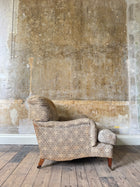 A late 19th Century Howard & Sons Harley Armchair