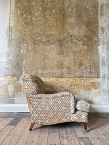 A late 19th Century Howard & Sons Harley Armchair
