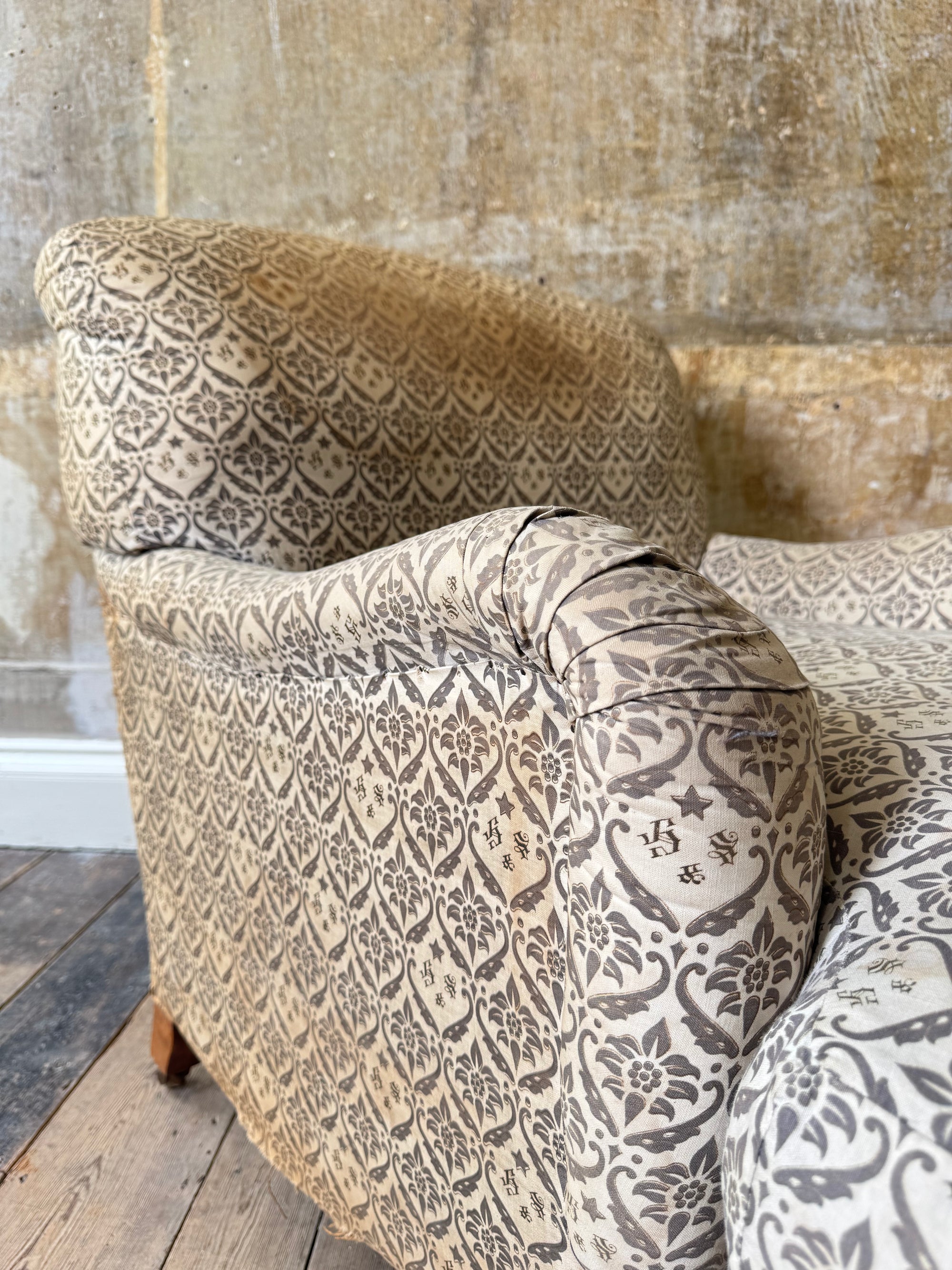 A late 19th Century Howard & Sons Harley Armchair