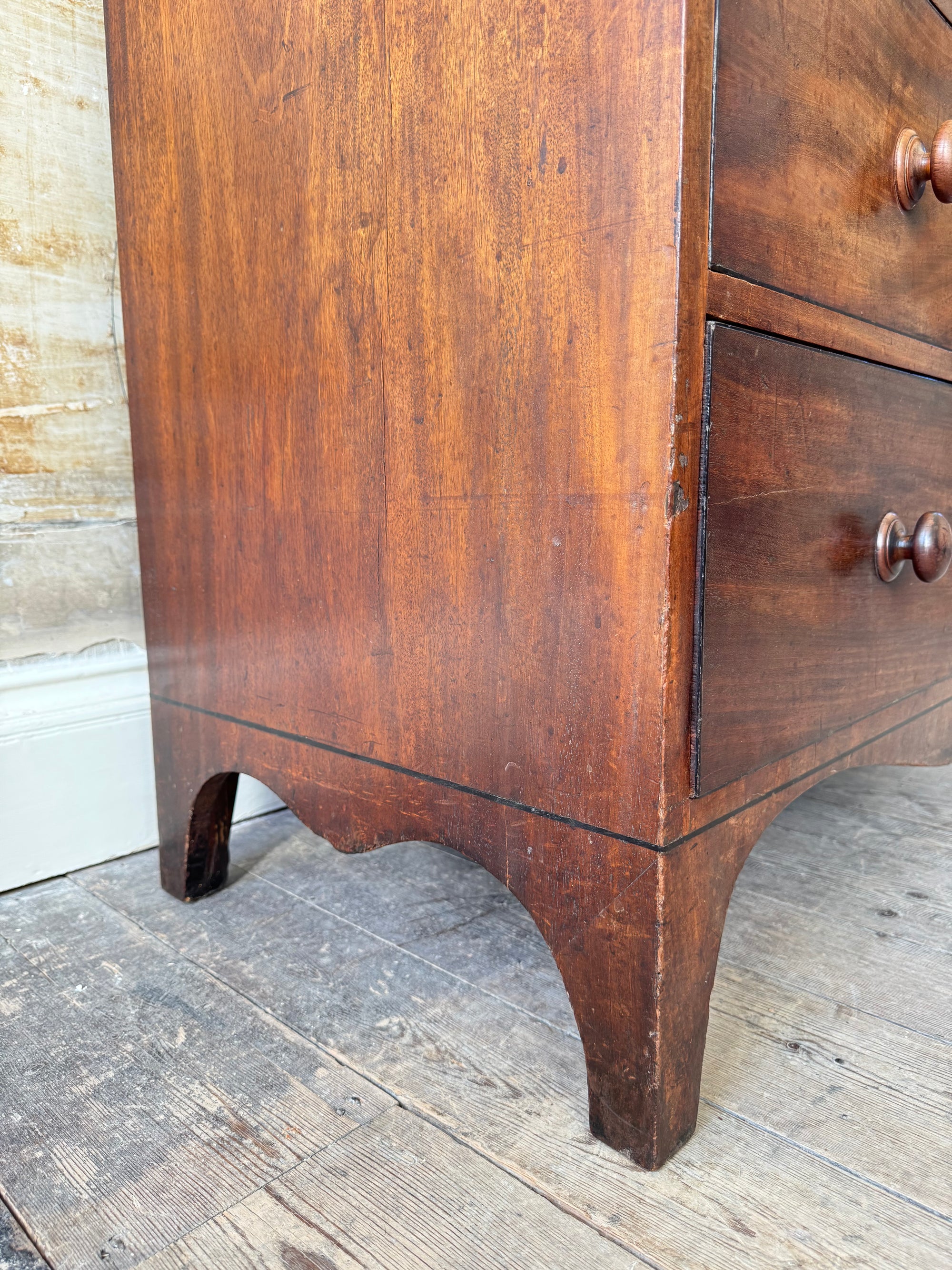 A George III Caddy-Topped Mahogany Chest Of Drawers