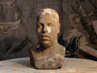 A Carved Stone Male Bust