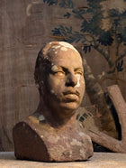 A Carved Stone Male Bust