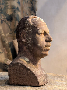 A Carved Stone Male Bust