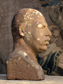 A Carved Stone Male Bust