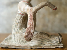 A Tang Dynasty Dancing Tomb Figure