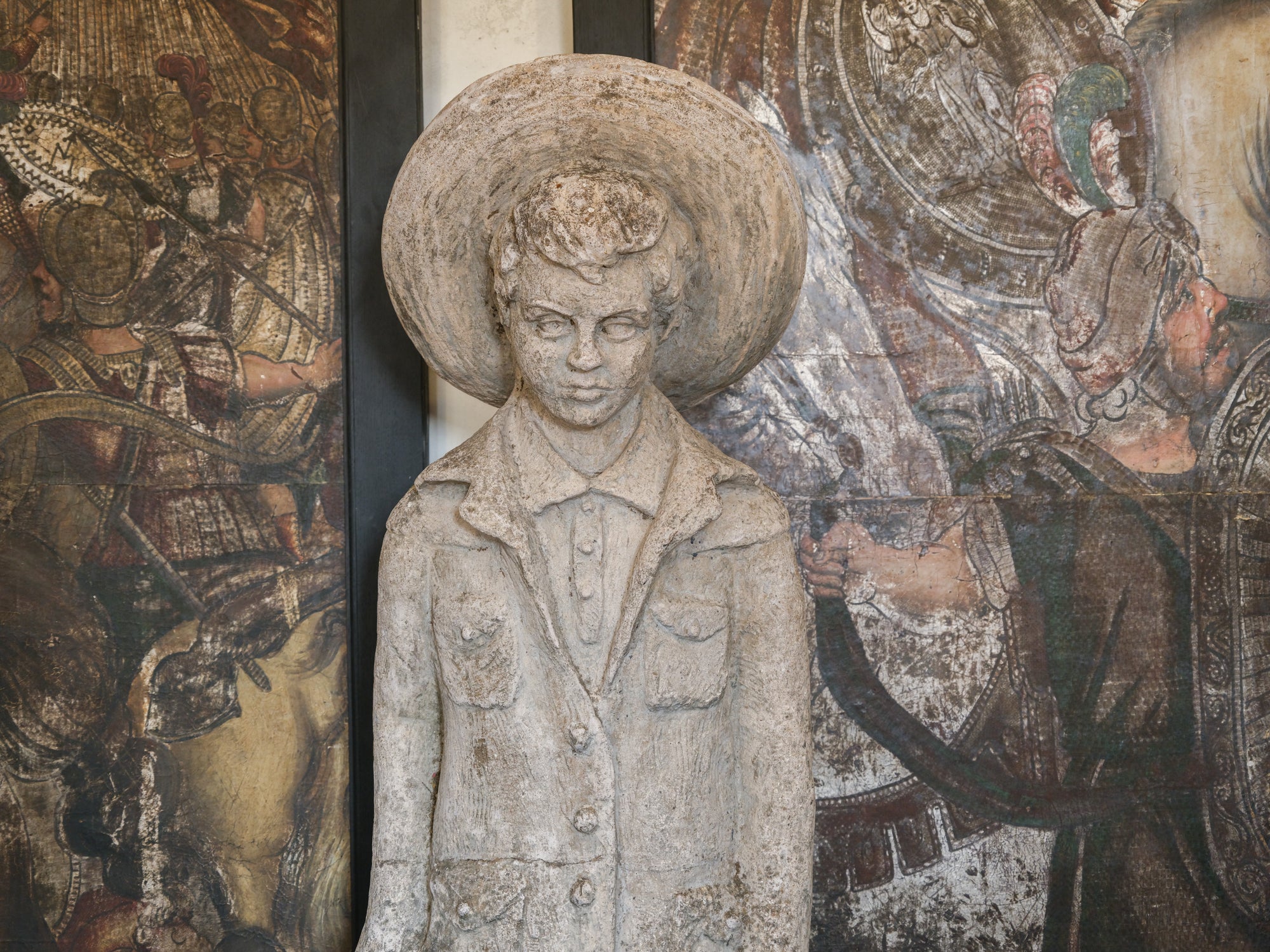 Statue of a Tall Boy