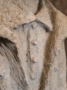 Statue of a Tall Boy