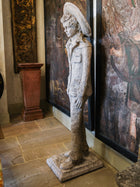 Statue of a Tall Boy