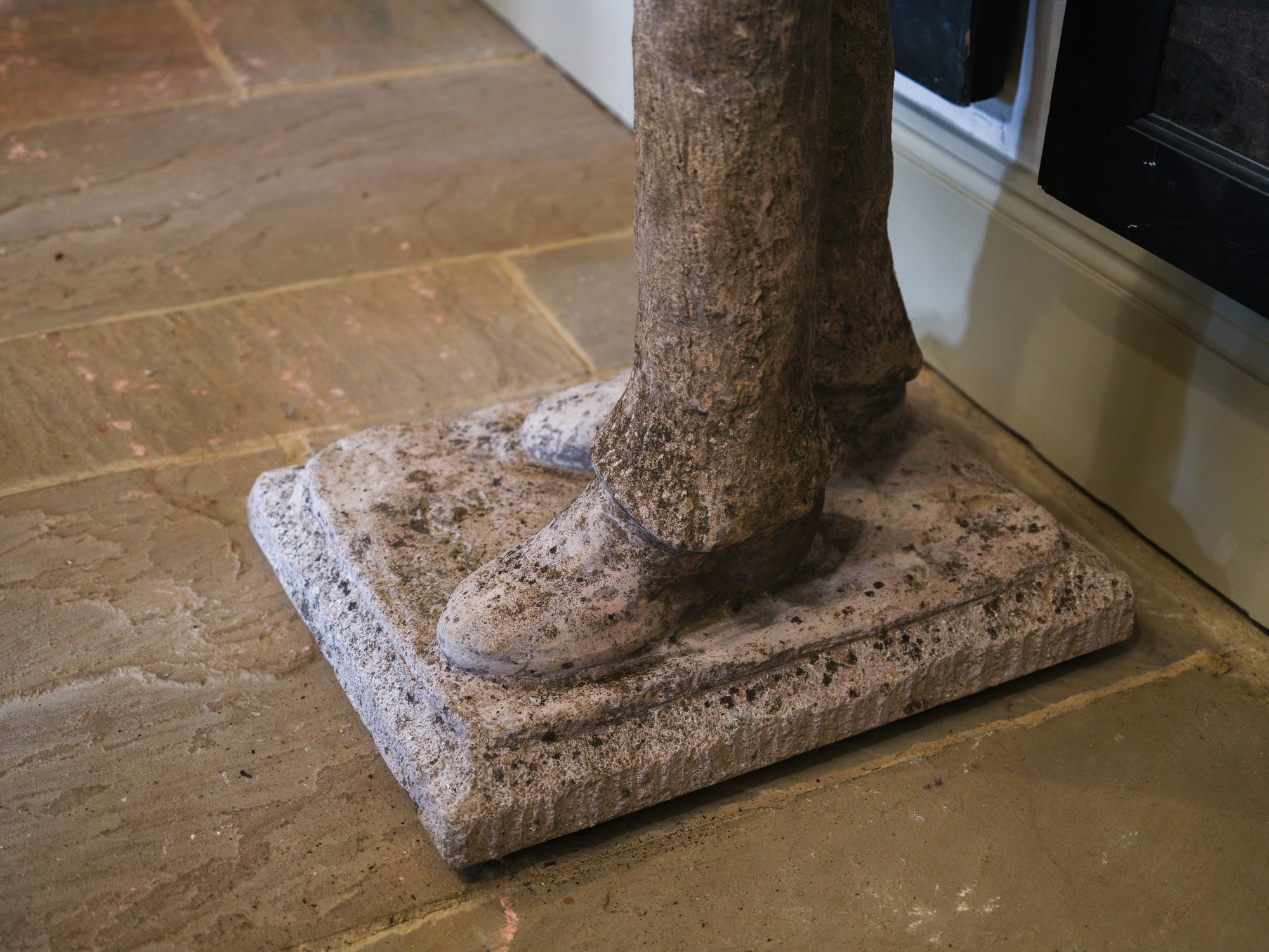 Statue of a Tall Boy