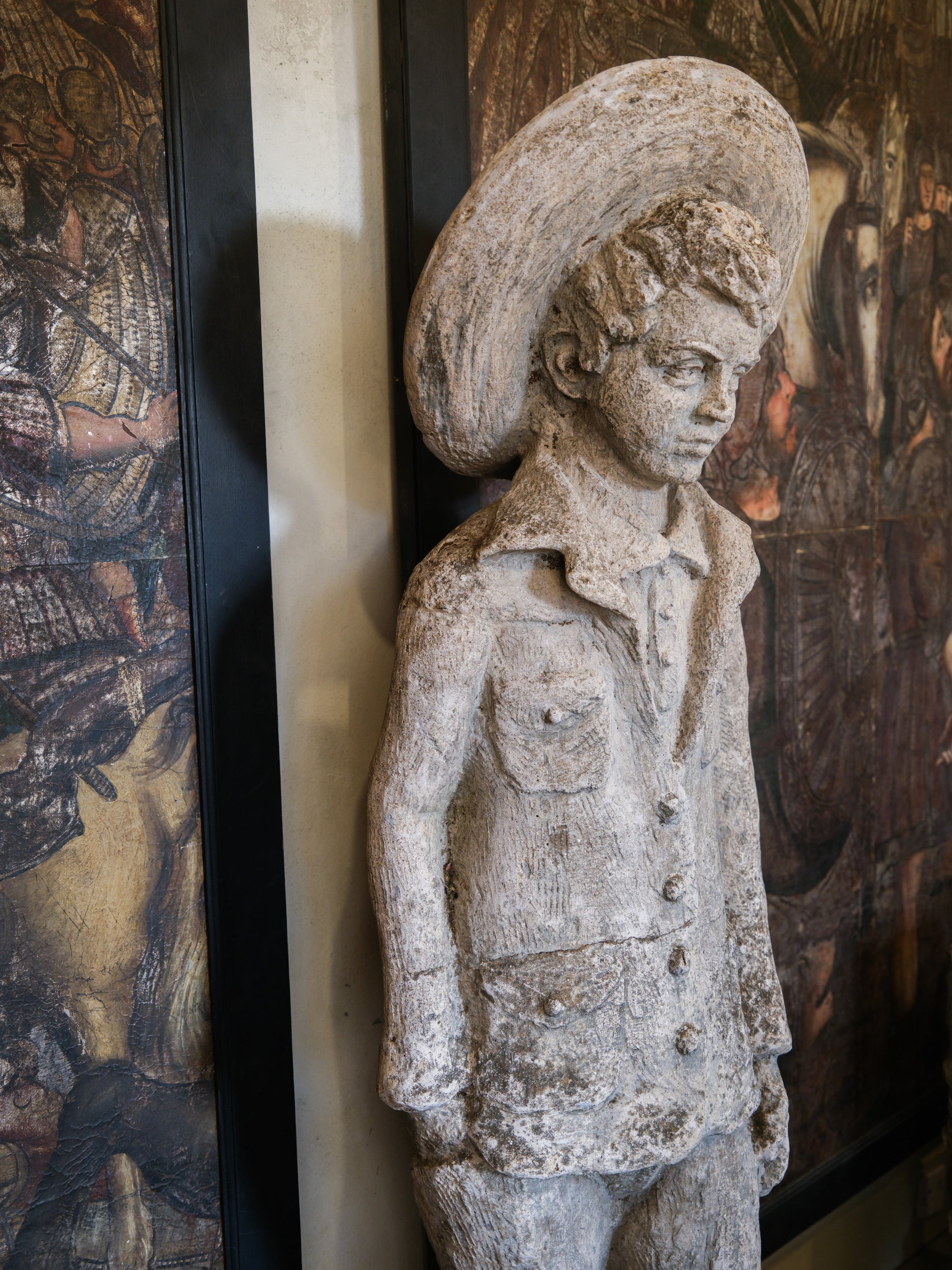 Statue of a Tall Boy