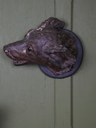 An Austrian Terracotta Dogs Head Mount
