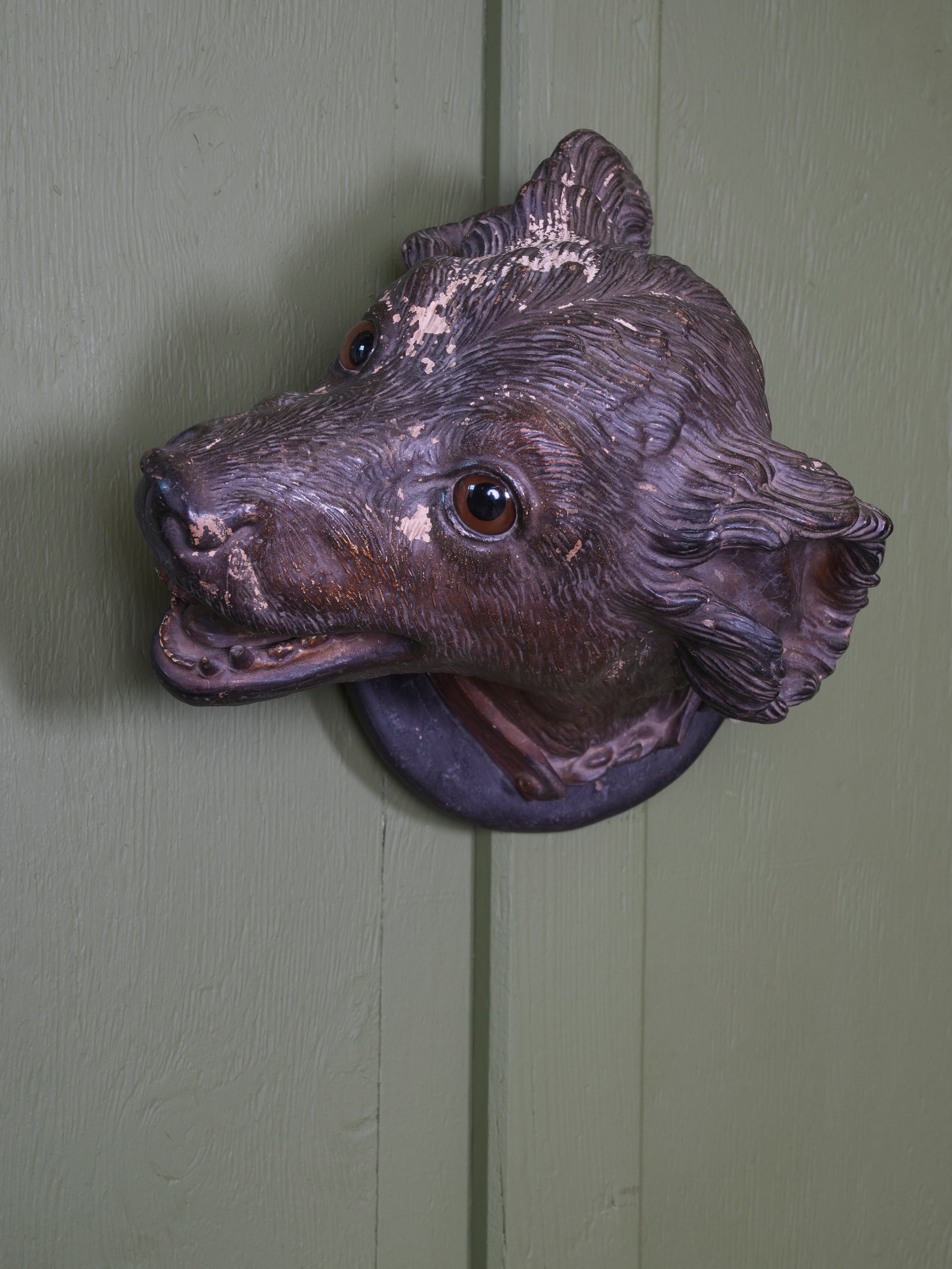 An Austrian Terracotta Dogs Head Mount