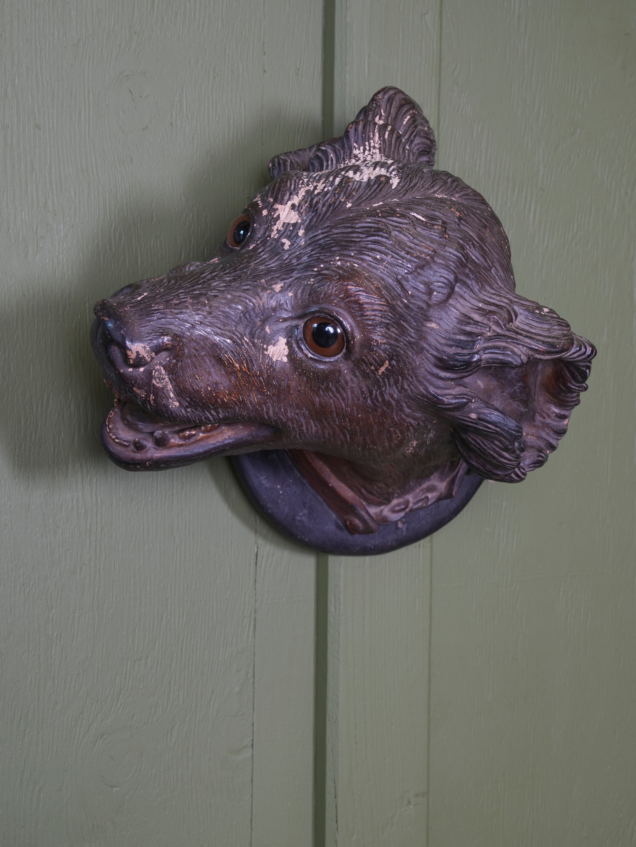 An Austrian Terracotta Dogs Head Mount