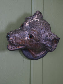 An Austrian Terracotta Dogs Head Mount
