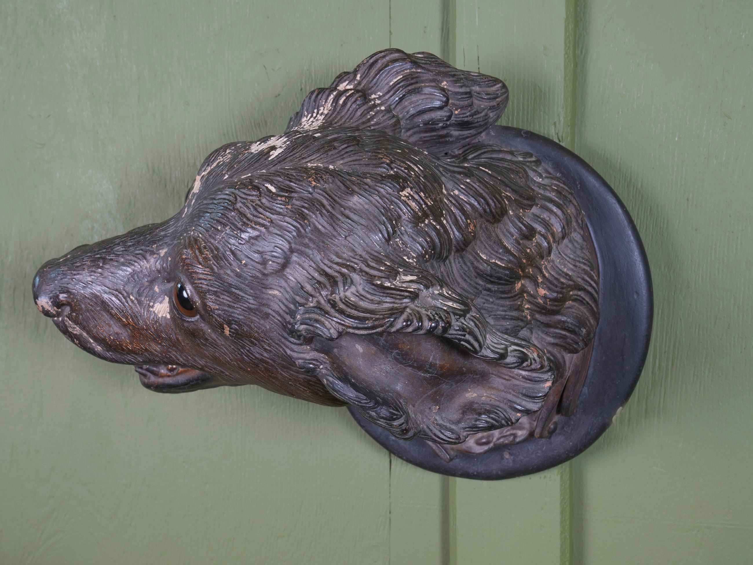 An Austrian Terracotta Dogs Head Mount