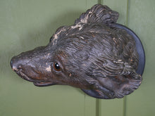 An Austrian Terracotta Dogs Head Mount
