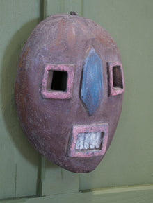 An African Kumu Face Mask