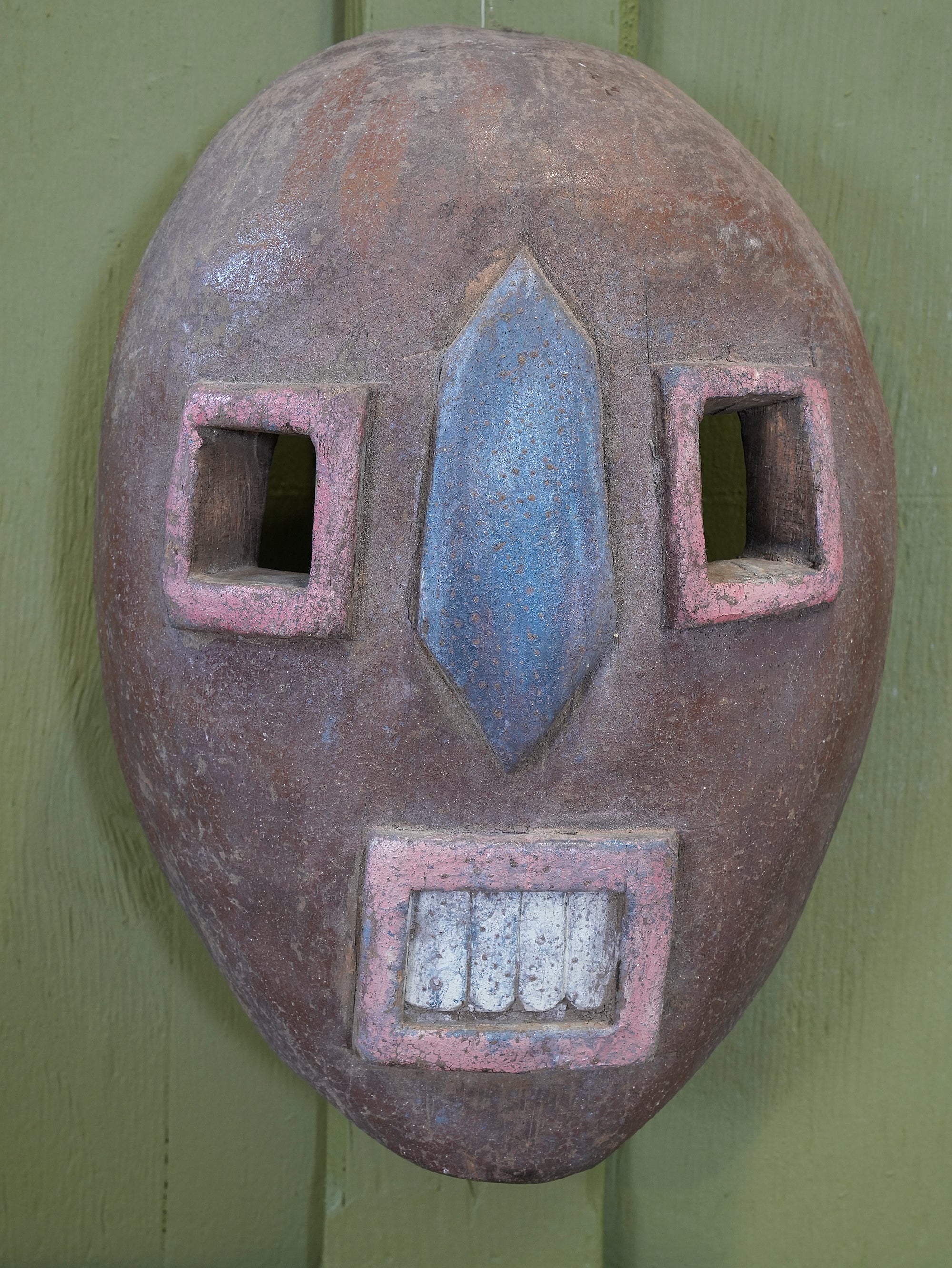 An African Kumu Face Mask