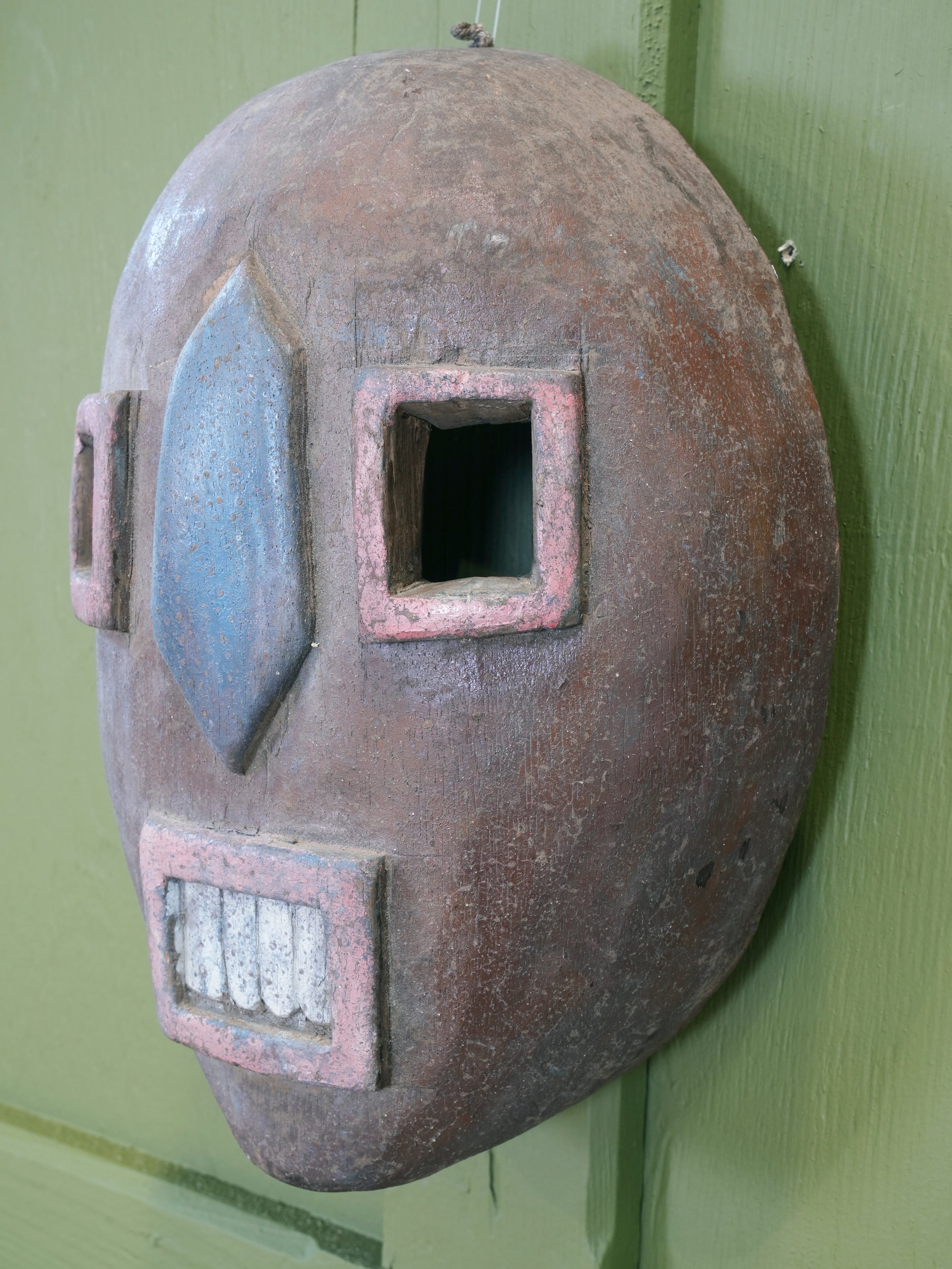 An African Kumu Face Mask