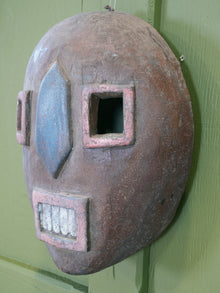 An African Kumu Face Mask