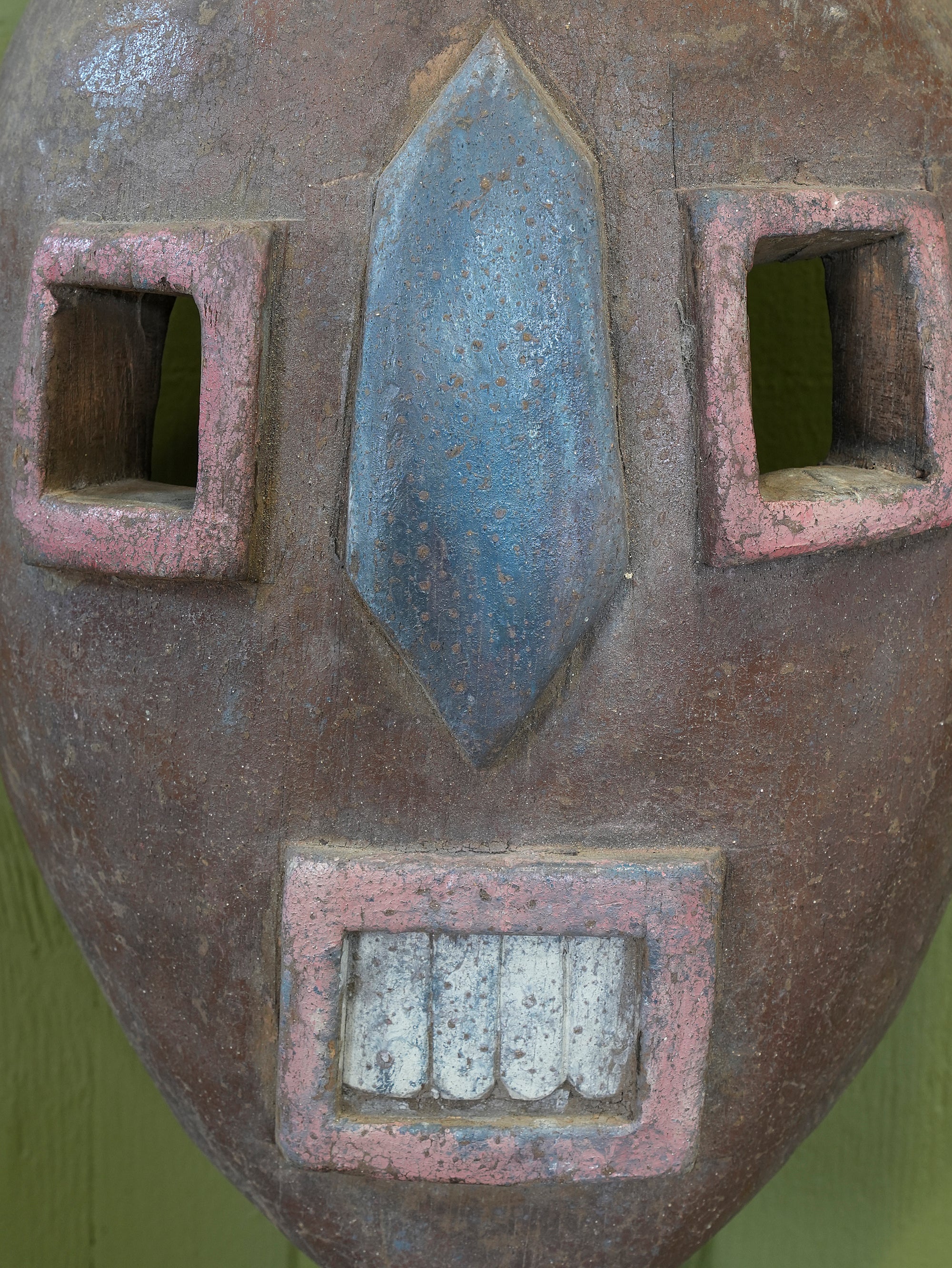 An African Kumu Face Mask