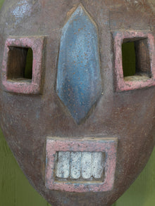 An African Kumu Face Mask
