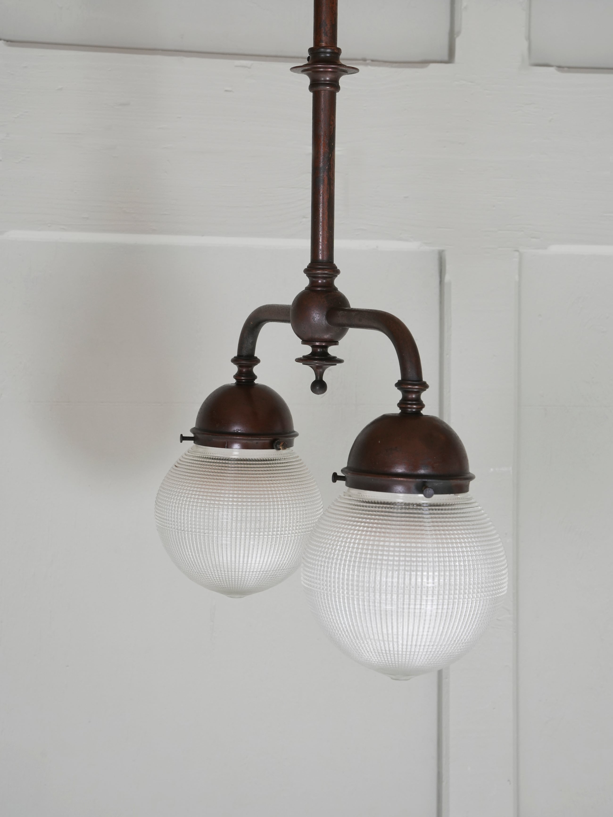 A Twin Holophane Ceiling Light
