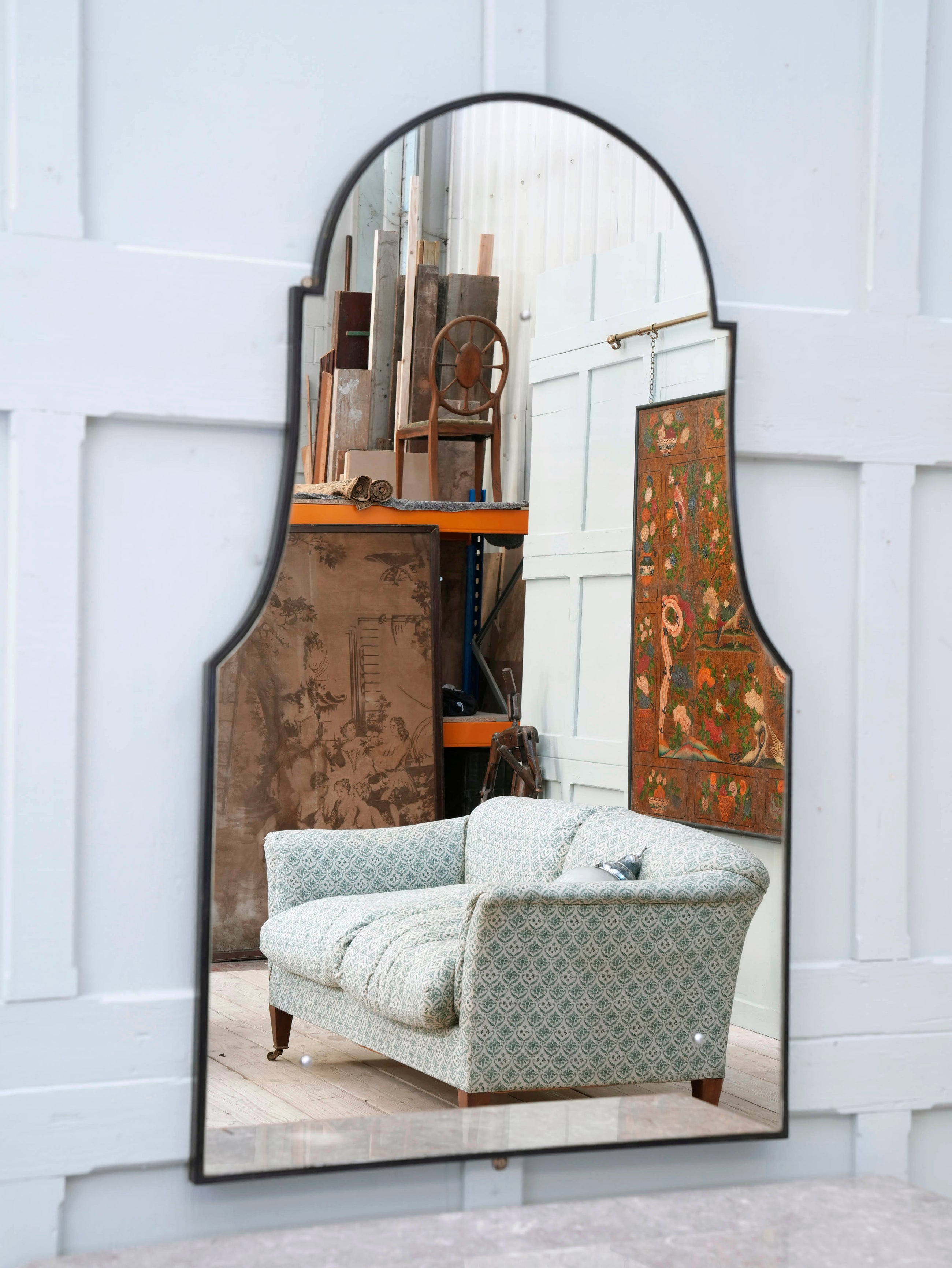 A Domed Top Mirror in a Reeded Timber frame