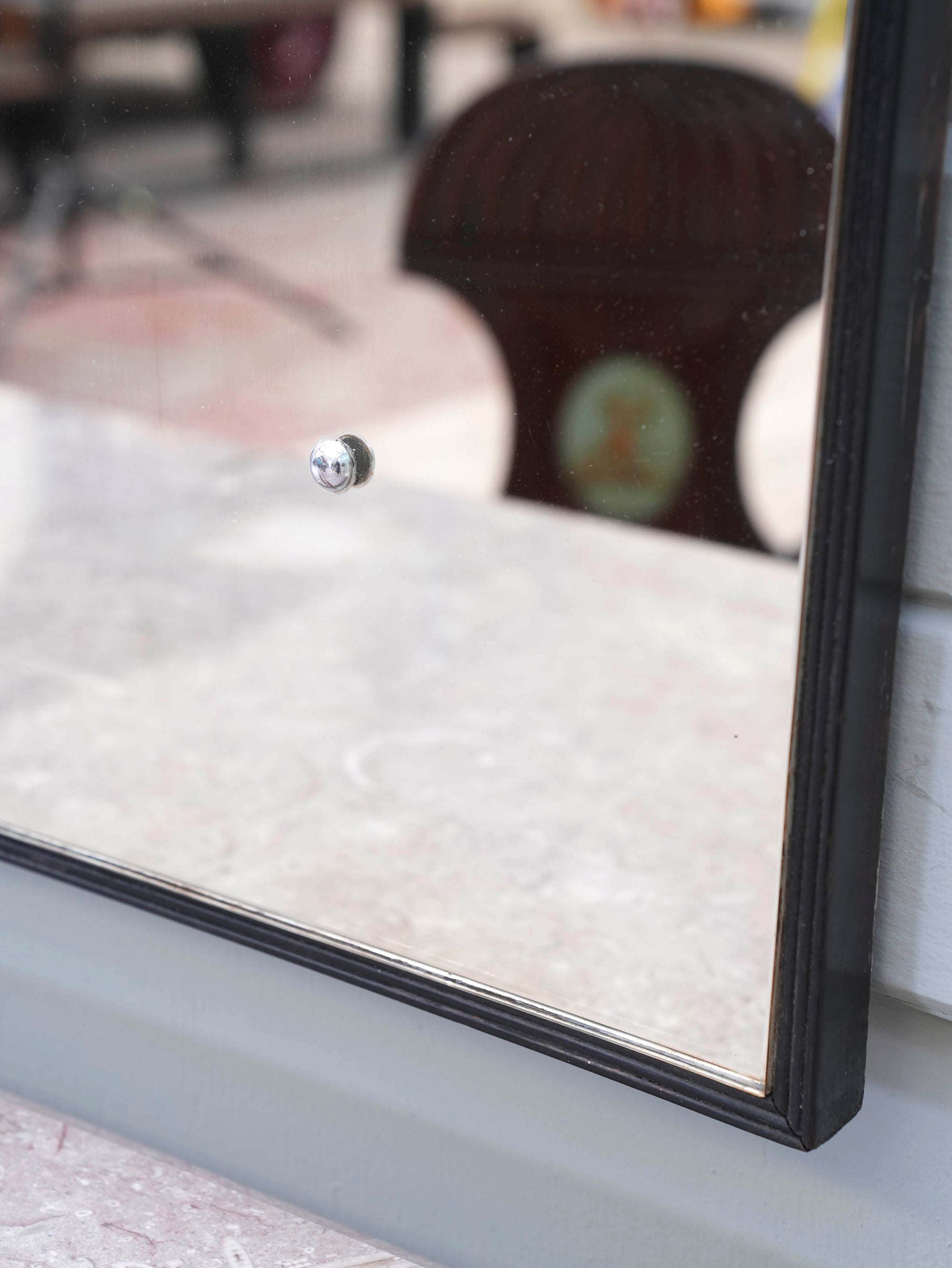 A Domed Top Mirror in a Reeded Timber frame