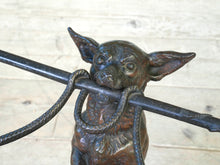 A Chihuahua & Crop Stick Stand