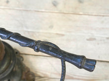 A Chihuahua & Crop Stick Stand