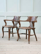 A Pair of 1920s Oak Desk Chairs