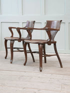 A Pair of 1920s Oak Desk Chairs