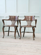 A Pair of 1920s Oak Desk Chairs