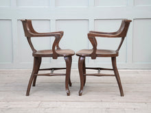 A Pair of 1920s Oak Desk Chairs