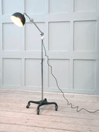 An Adjustable Nickel Plated Floor Lamp