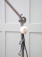 An Adjustable Nickel Plated Floor Lamp