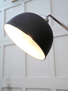 An Adjustable Nickel Plated Floor Lamp